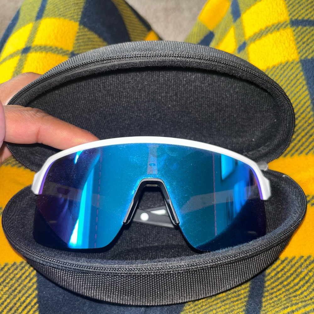 White Oakley sutro Sunglasses with Blue Lenses